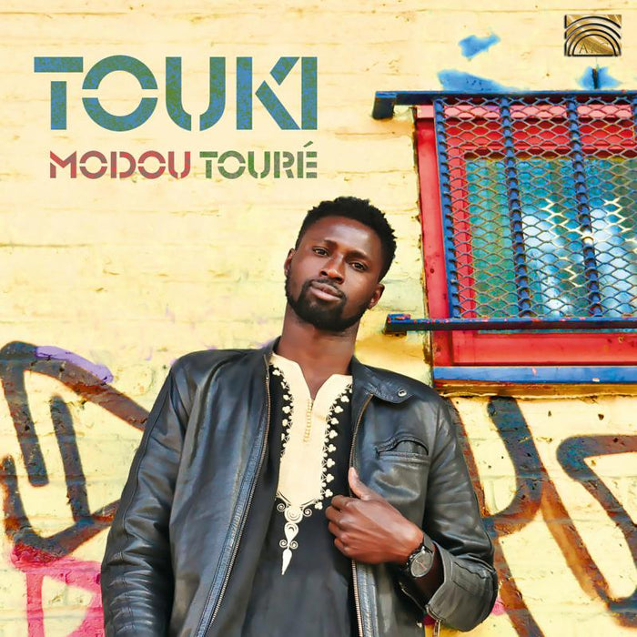 Modou Toure: Touki